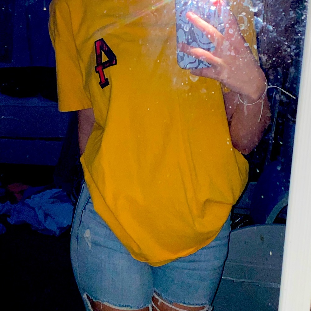 Plain yellow “4” Tee